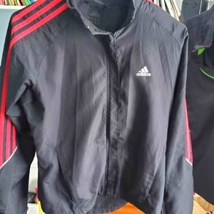 Adidas windbreaker size med in gray and red